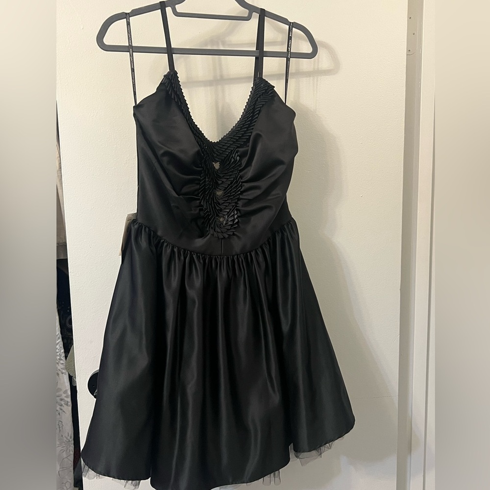 NWT Jessica McClintock black dress with adjustable corset-like bodice. Size 9